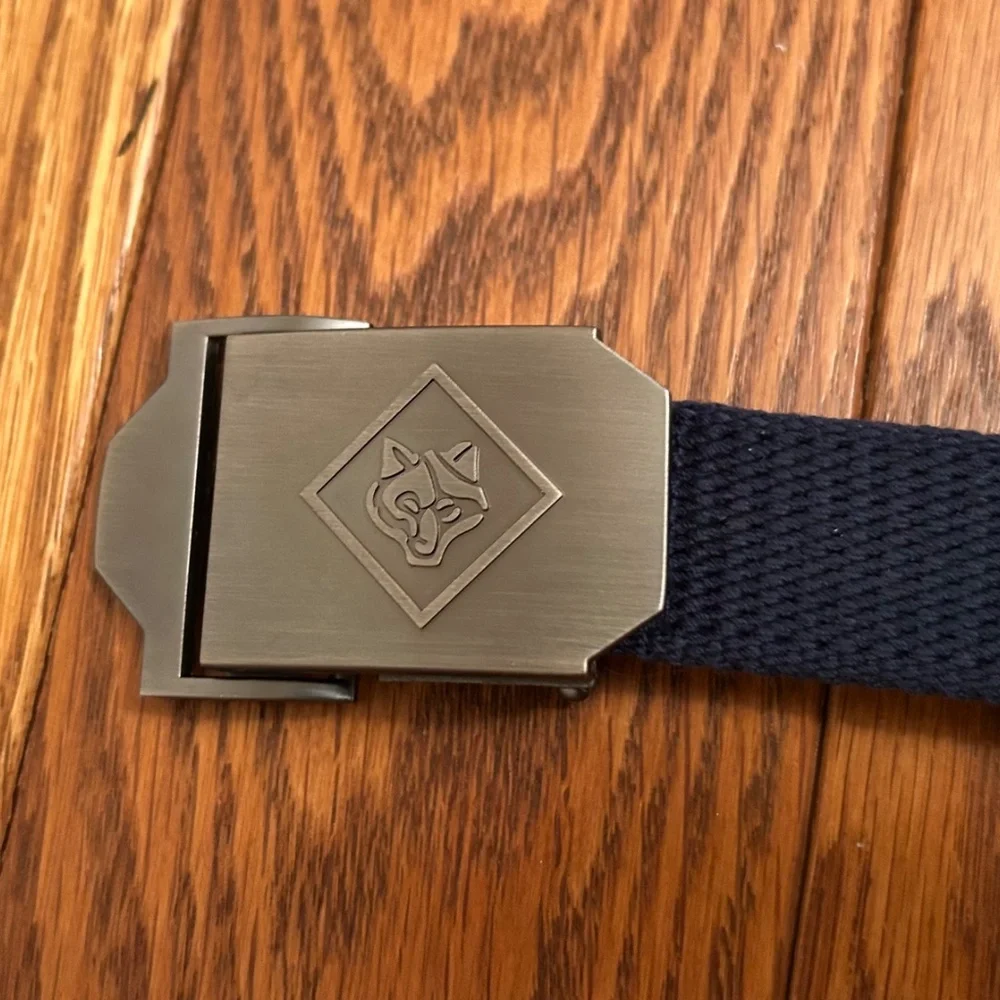 NWOT Cub Scout wolf buckle uniform belt. Blue canvas cut to fit size.